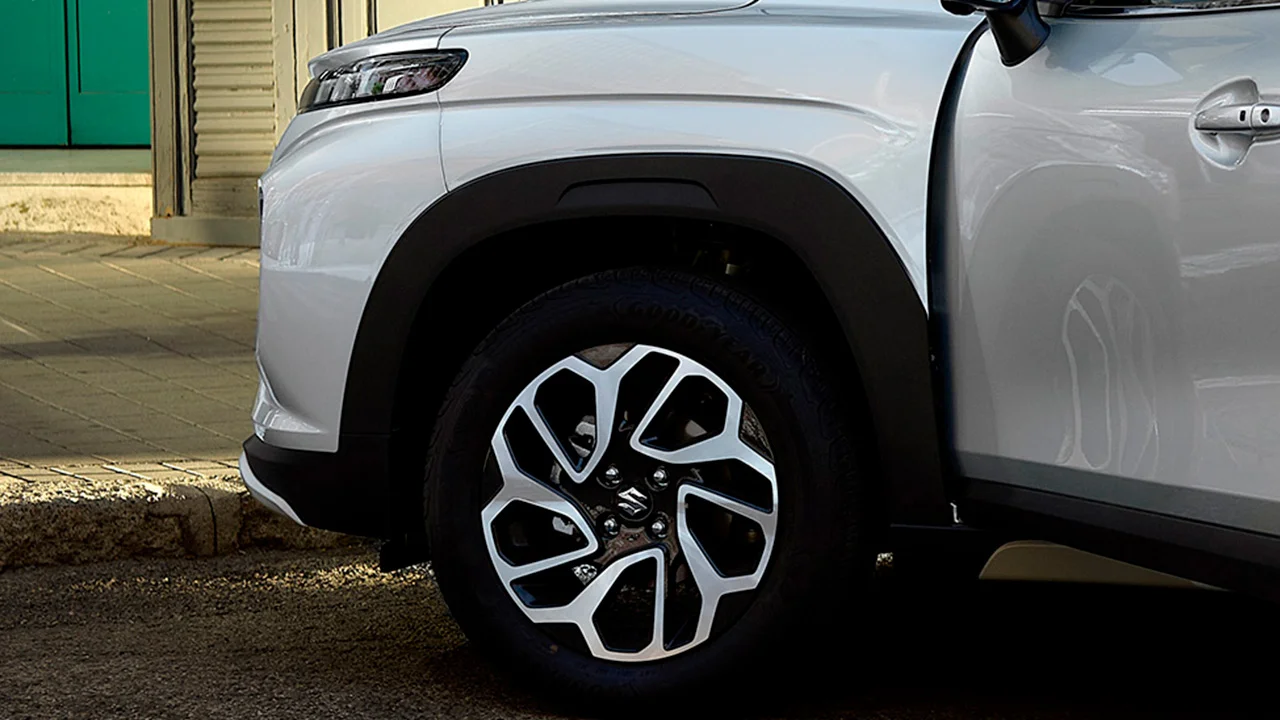 Vehiculo Fronx gris llantas